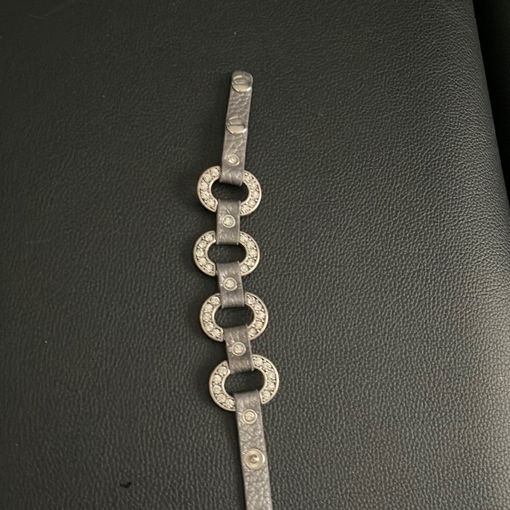 Leather snap bracelet.